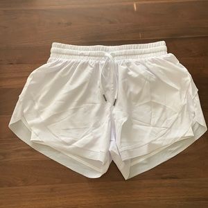 White Halara drawstring contrast flowy mesh shorts with interior shorts / lining